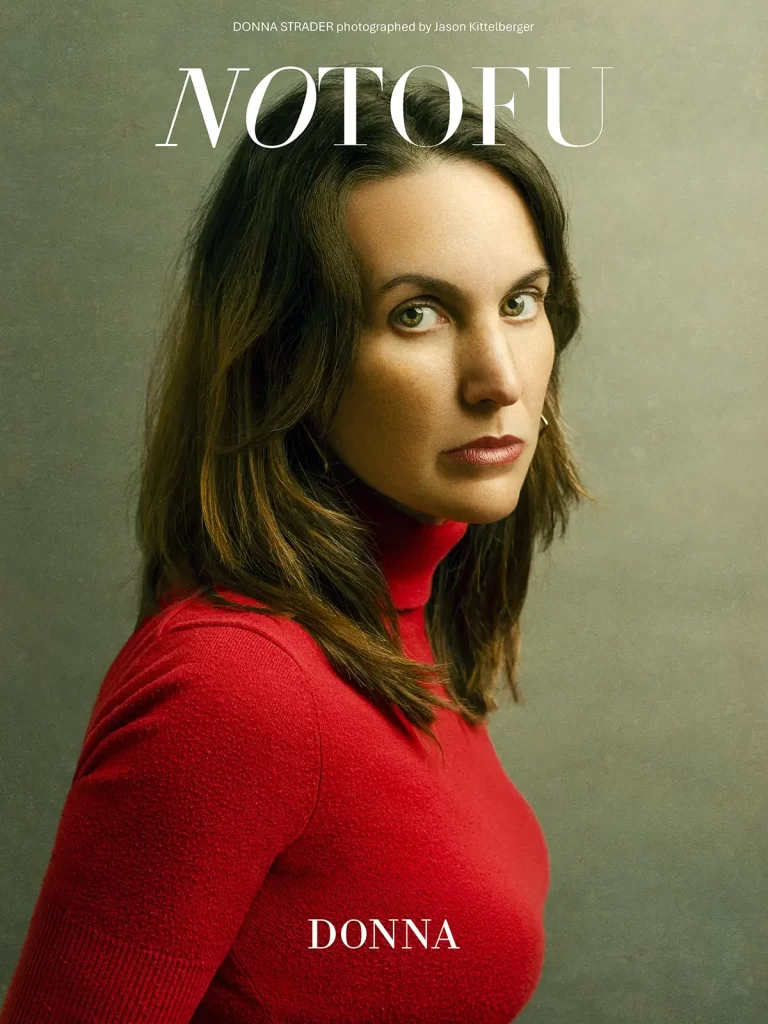 Notofu magazine cover. Woman in a red turtleneck sweater on a light green background.