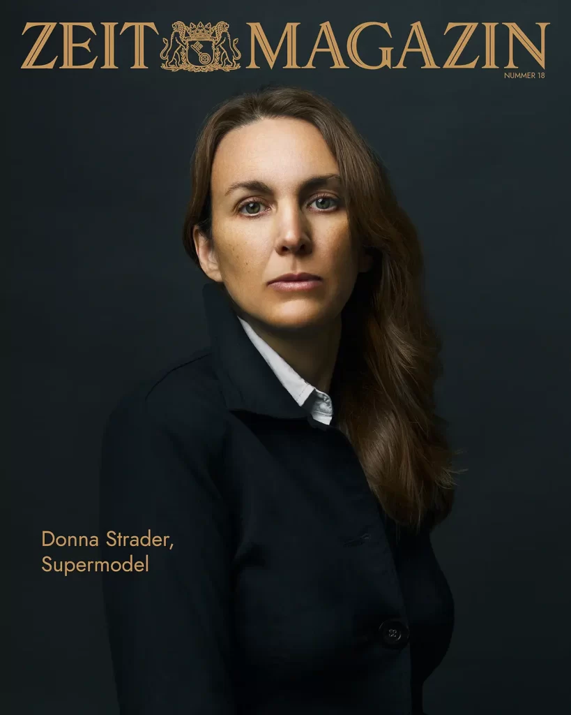 Zeit magazine cover. Woman in a black jacket with long brown hair on a dark background.
