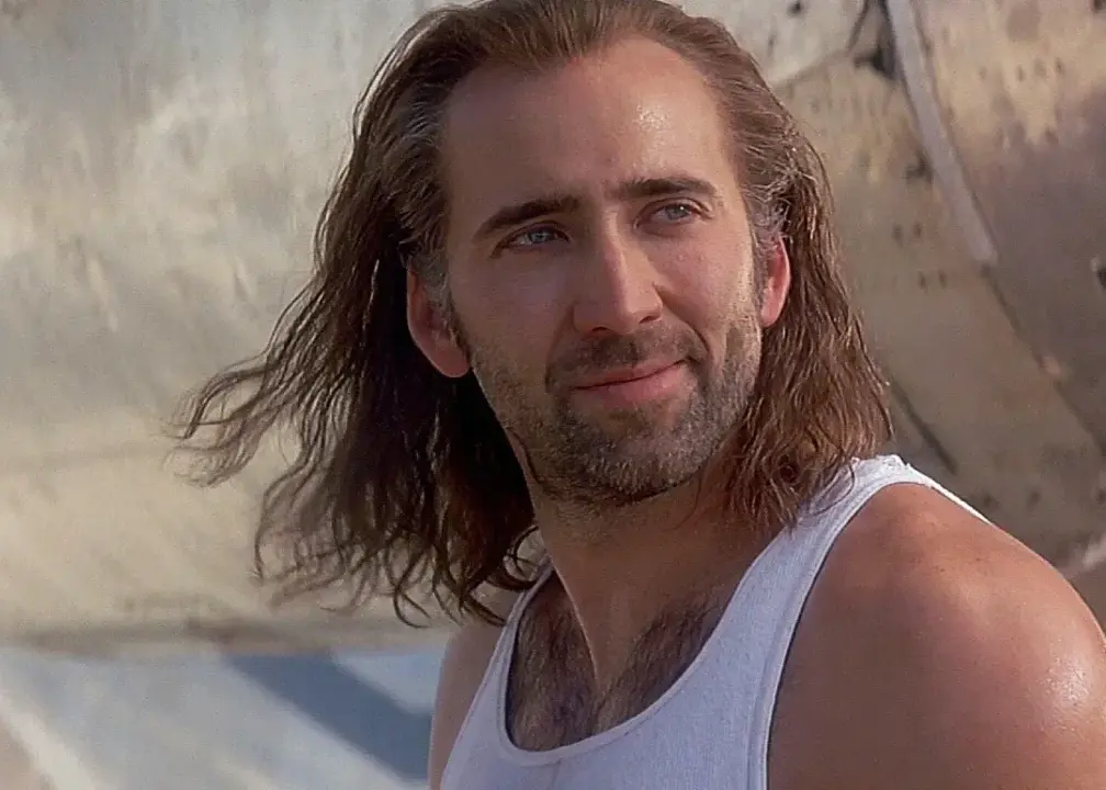 Nicolas Cage in the movie Con Air making a dramatic face.